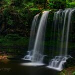 Sgwd yr Eira or Fall of Snow with late afternoon sun bouncing off the water. A long exposure captures the power and delciacy of the falls.