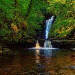 Sgwd Einion Gam (or all of the Crooked Anvil) a first glimpse up the river, with a minor, unnamed fall in front.