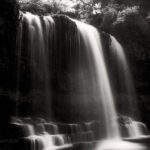 A close up shot of Sgwd yr eira in B&W and captured as a long exposure.