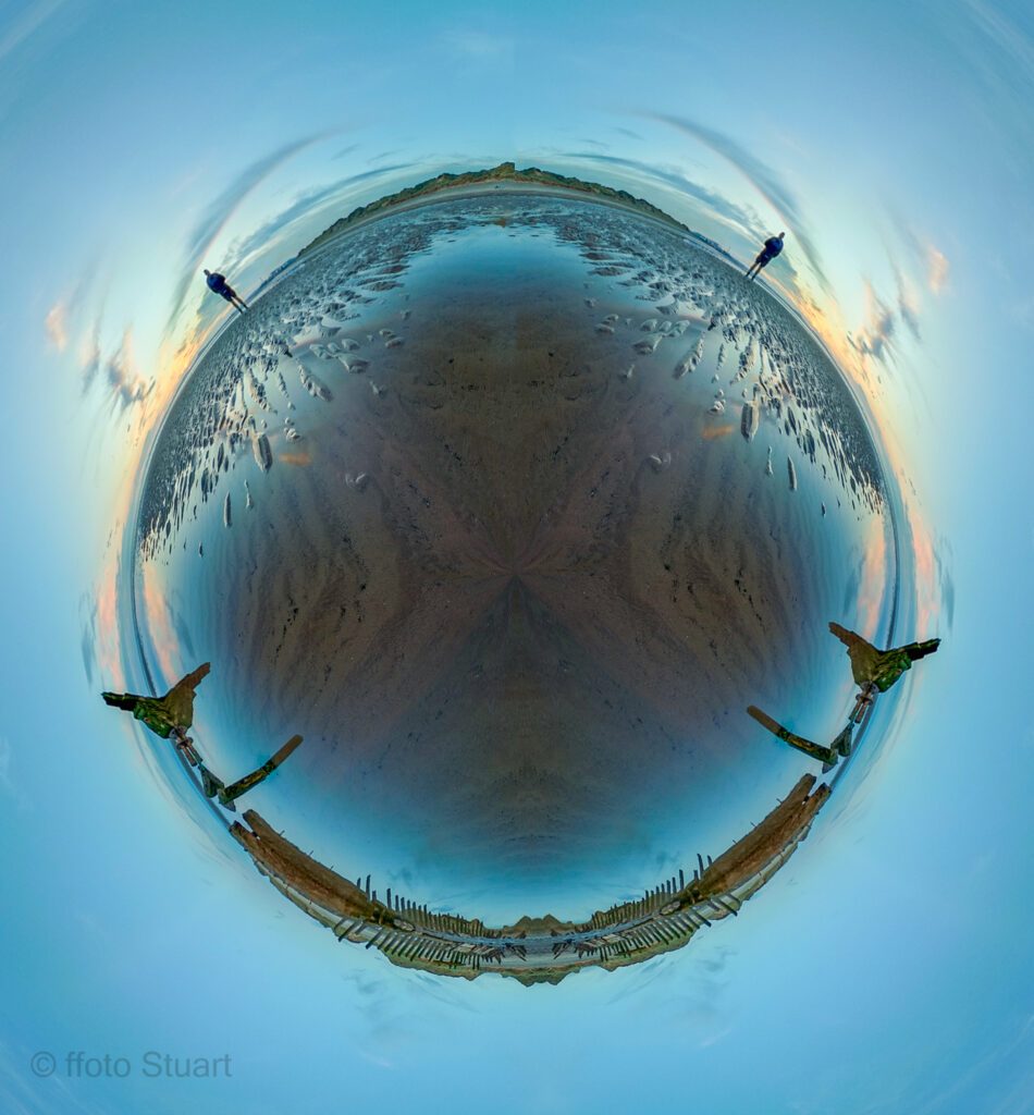 A shipwreck shot as a Tiny Planet in 360. Image looks like a giant blue marble.